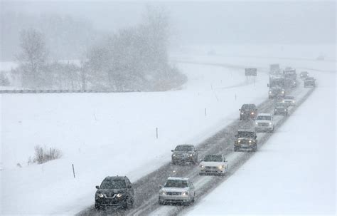 Snow-covered highway in Michigan during a previous winter storm